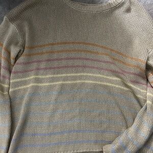 Beige sweater with rainbow stripes